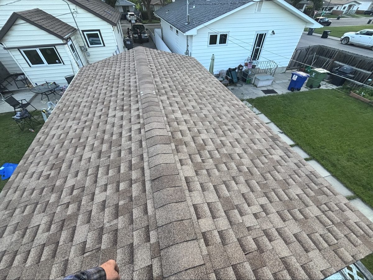 New brown asphalt shingle roof installed by No Stress Roofing