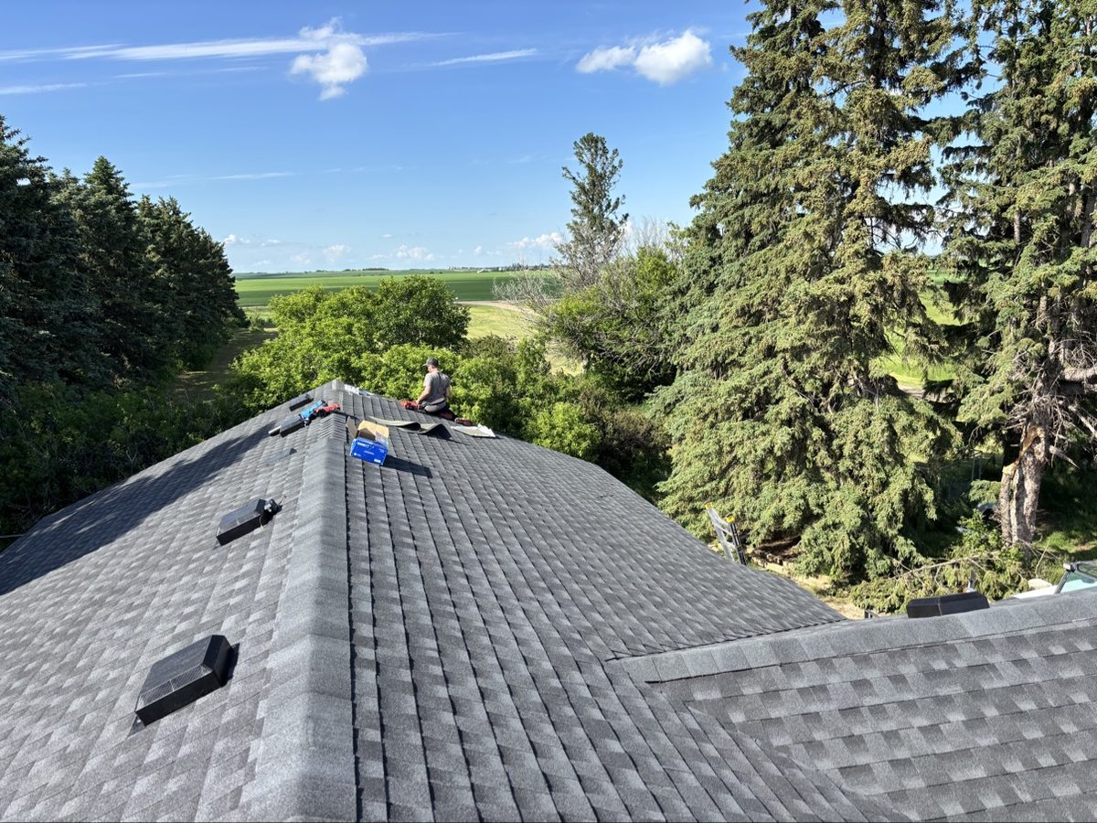 No Stress Roofing crew member on a roof during installation