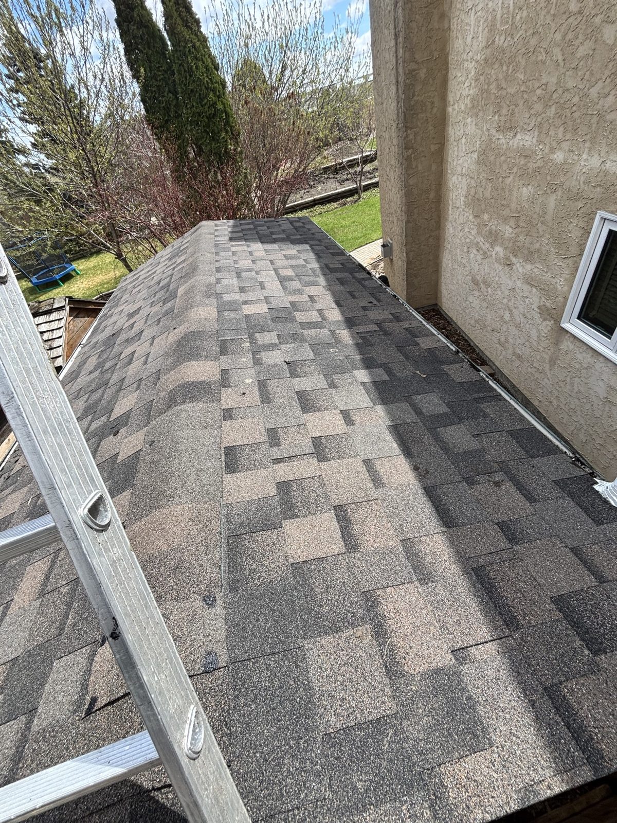 New asphalt shingle roof installed by No Stress Roofing