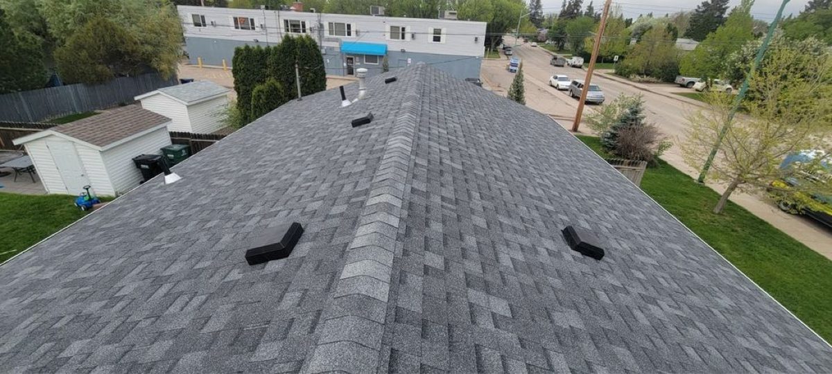 New gray shingle roof installed by No Stress Roofing